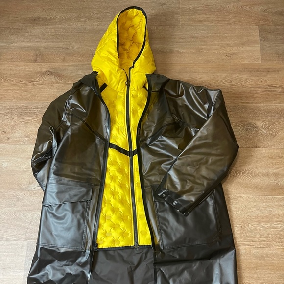 Nike sportswear tech pack down-fill rain coat with the jacket on
